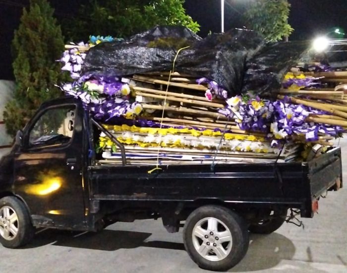 Photos of employees actively arranging flowers and delivery (2)